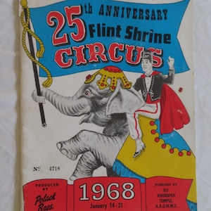 May include: Vintage 1968 Flint Shrine Circus program cover. The cover features an illustration of an elephant with a performer riding on its back. The text reads "25th Anniversary Flint Shrine Circus".