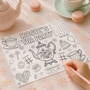 Peut inclure: Une feuille d'activités en papier blanc intitulée Rosie's Tea Party avec des illustrations au trait noir comprenant une théière, des tasses, un gâteau, un cadeau, des cœurs, des fleurs, des bonbons, des ballons, des grilles de morpion et un mot mêlé.