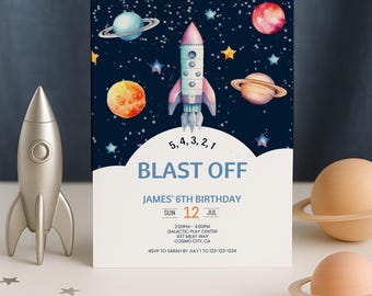 May include: A rectangular birthday invitation card featuring a watercolor space scene with a rocket, planets, and stars. The text reads: 5, 4, 3, 2, 1 BLAST OFF, JAMES' 6TH BIRTHDAY, SUN 12 JUL, 2:00PM-4:00PM, GALACTIC PLAY CENTER, 437 MILKY WAY, COSMO CITY, CA, RSVP TO SARAH BY JULY 1 TO 123-123-1234.