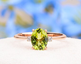 Oval Peridot Engagement Ring: Rose Gold Diamond Cluster Wedding Ring
