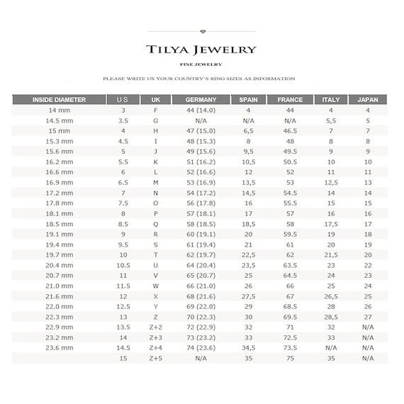 Handmade 14k Gold Montana Teal Sapphire Ring: Pear Cut Diamond