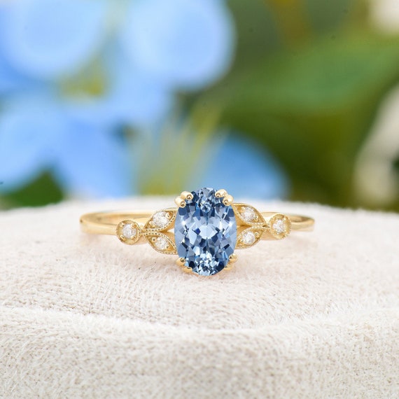 Sapphire yellow gold engagement rings discount