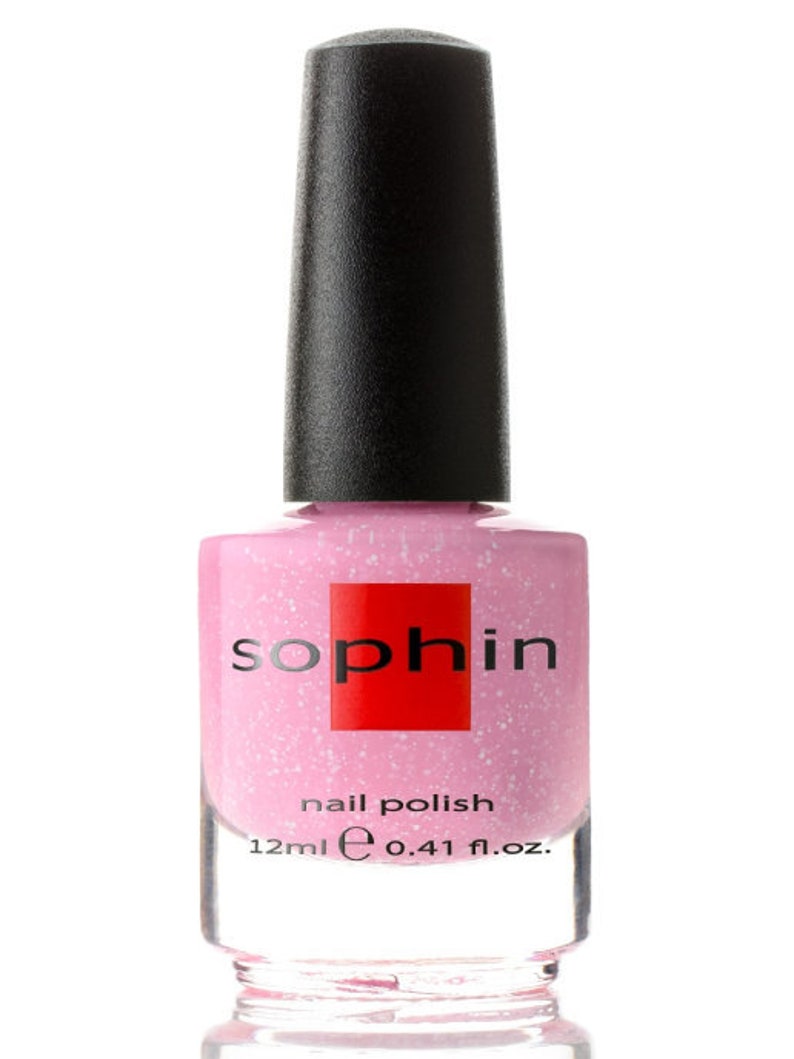 May include: A pink nail polish bottle with a black cap and the word "sophin" in red letters on the front. The bottle is labeled "nail polish" and contains 0.41 fl. oz. of polish.