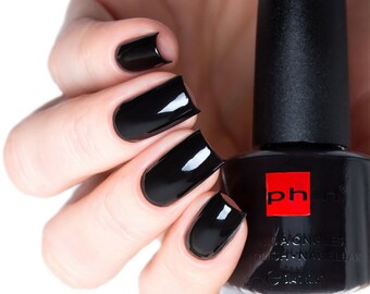 Black nail polish. High gloss finish. Vegan lacquer. Beautiful manicure. Natural nails. Vegan cosmetics.