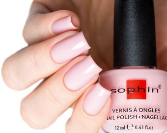 Light pink nail polish. Sophin 0015. pastel neutral lacquer. cosmetics for natural nails. super glossy finish. stylish manicure.