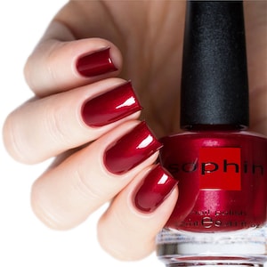 Red shimmer nail polish. Sophin 0198. bright lacquer. For sparkling long-lasting trendy manicure. vegan cosmetics. Safe for your nails.