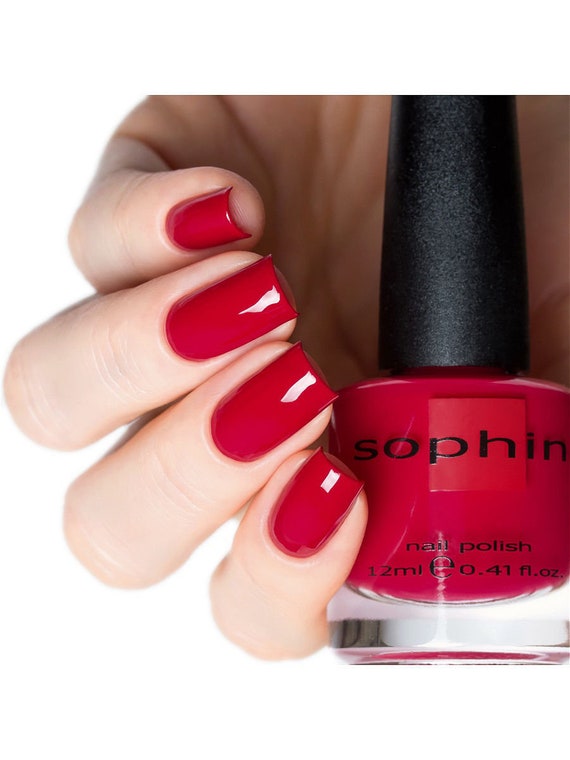 Raspberry red nail polish. Sophin 0071. high gloss nail polish. long-lasting finish. quick dry coating. Vegan cosmetics. Bright red nails.