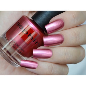 Cool red-pink metallic nail polish. Sophin 0319. Light raspberry lacquer with silver shimmer. For beautiful natural manicure. glitter nails.