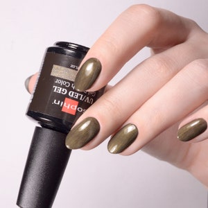 Olive gold gel polish. Sophin 0737 Illusory green. Spectacular glossy shine, bright color, stunning durability.