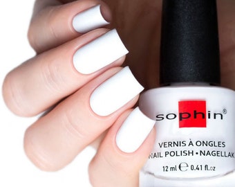 White nail polish. High gloss finish. Vegan lacquer. Beautiful manicure. Natural nails. Vegan cosmetics.