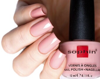 Soft beige-pink nail polish. Sophin 0005. nude color lacquer. cosmetics for natural nails. pastel glossy finish. stylish manicure.