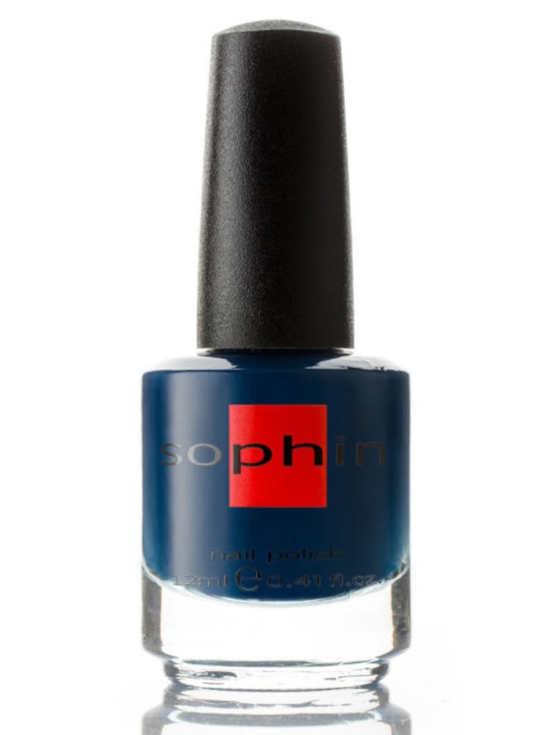 May include: A dark blue nail polish bottle with a black cap and a red label that says "sophin" and "nail polish".