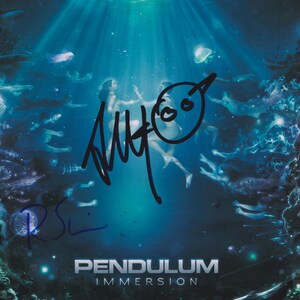 May include: A signed poster for the album "Pendulum Immersion". The artwork features an underwater scene with figures, marine life, and the band's name. The background is a gradient of blues and greens.