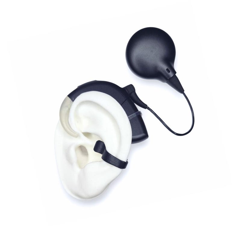 Our insurance Flexi Clip shown here on a cochlear implant that has a behind the ear processor it is used to keep the cochlear implant fro getting lost