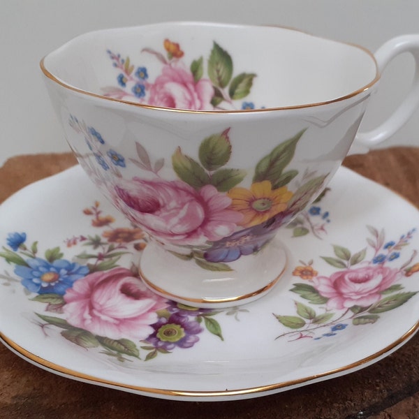 Richmond Bone China England, porcelain cup and saucer, richly decorated with beautiful flowers, such as the rose, with gilt edges, 1950s