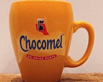 Chocomel, one mug or set of two yellow &#39;classic&#39; mugs from the Dutch chocolate milk brand, logo of the hand with the glass of chocolate milk
