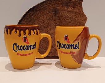 Chocolate milk, separate mug or set of two special mugs from the famous Dutch chocolate milk brand, logo of the hand with the chocolate milk