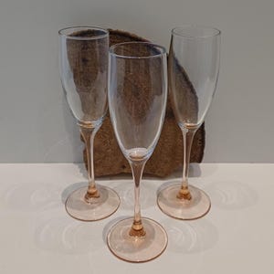 Luminarc - France, set of three champagne glasses, pink stem and foot, 22.2 cm/8.66 in high, diameter top 5 cm/1.97 in, 70s