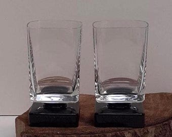Disaronno - Italy, single glass or set of two liqueur glasses on an elegant black square base, 70's