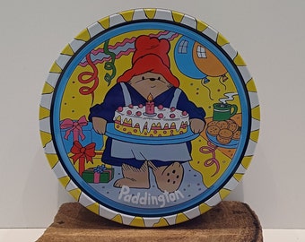 Paddington Bear cookie tin, cookie tin, with a nice image of Paddington holding a large cake on the lid, 1990s