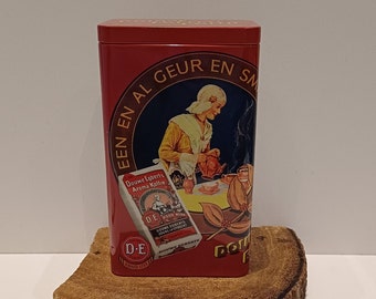 Douwe Egberts, a nostalgic retro tin for storing a pack of coffee, with an image of a lady in Frisian (Netherlands) traditional costume