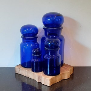 Cobalt blue round glass Belgian apothecary jars, with a blue bell jar with a plastic seal, different sizes, 70&#39;s