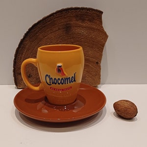 Chocolate milk, one nice yellow mug, or mug with saucer, embossed! the well-known Chocomel logo