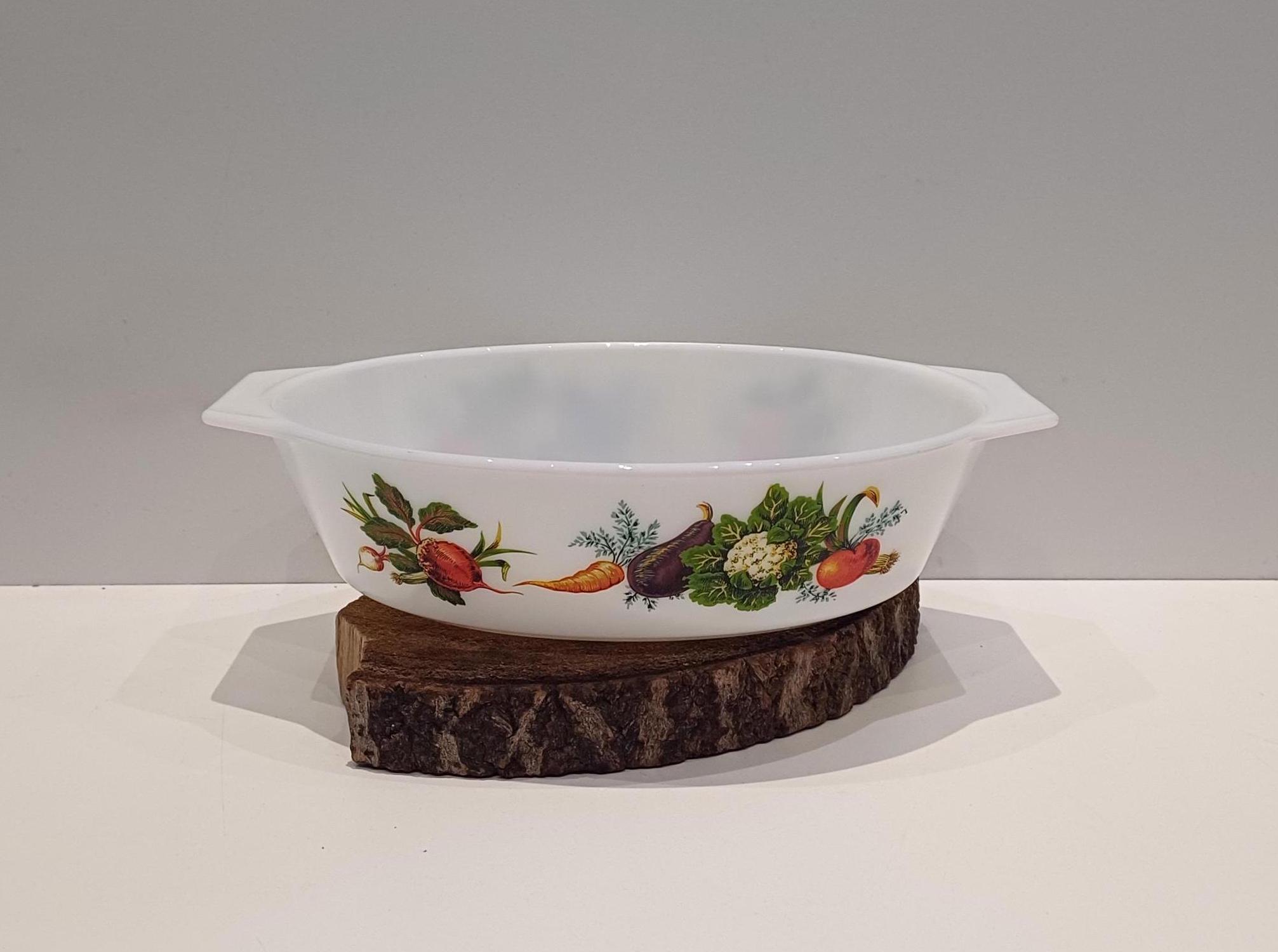 Pyrex - England; beautiful oval dish made of milk glass, with a colorful image of Tuscan vegetables on two sides, 1970s