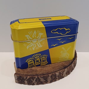 Wasa - Sweden, blue with yellow storage tin for Wasa crackers, images of grain and the sun, made in the years 1985 - 1999