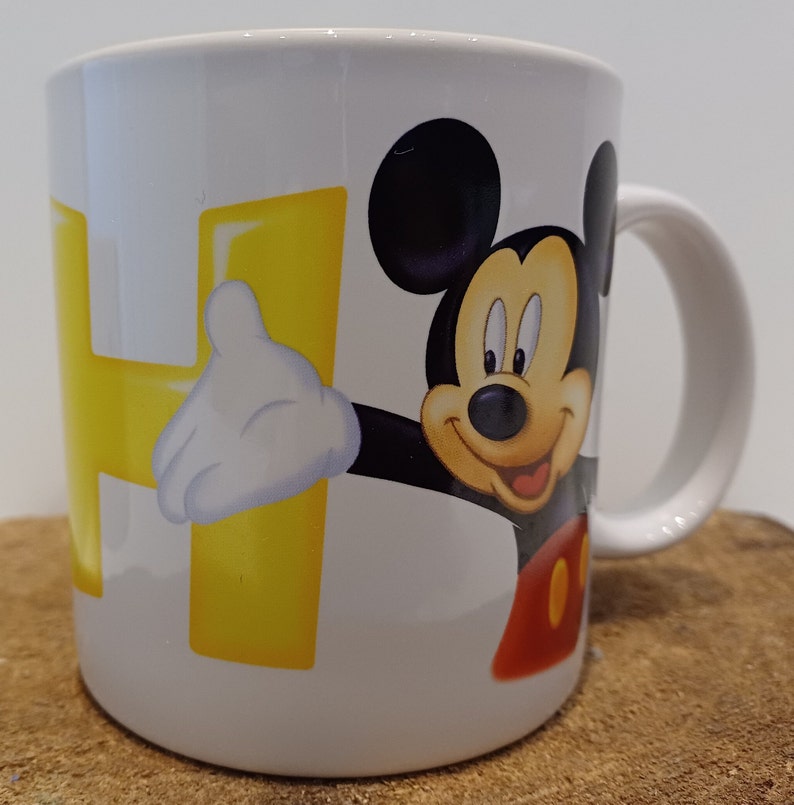 Musse Pigg, vackra stora muggar; mugg A - mugg med unikt handtag, mugg B - Musse Pigg med bokstaven H - Disneyland Paris, priset är per mugg bild 6