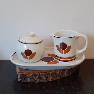 Mosa-Maastricht, Holland, a retro cream set consisting of a milk jug, sugar bowl and bowl, retro flower decor, 60s, 70s