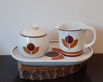 Mosa-Maastricht, Holland, a retro cream set consisting of a milk jug, sugar bowl and bowl, retro flower decor, 60s, 70s