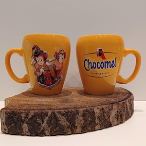 RESERVED MUG A AND B Chocomel - Efteling, mug, image of Pardoes and Pardijn, and the well-known logo of the glass of chocolate milk