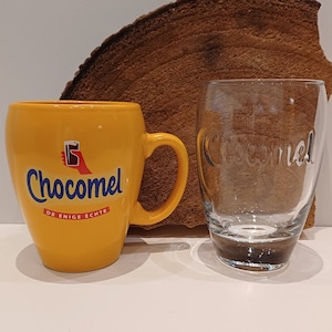 Chocomel, set of a classic yellow Chocomel mug and Chocomel glass, embossed &#39;Chocomel&#39; on the glass and &#39;chocomel glass&#39; logo