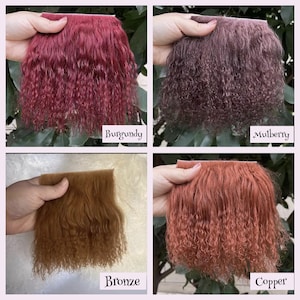 May include: A four-panel grid showing swatches of curly fiber in four distinct colors. The top left is labeled Burgundy, the top right is Mulberry, the bottom left is Bronze, and the bottom right is Copper. Each swatch has a textured, wavy appearance.