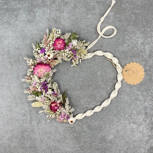 Heart-shaped dry flower wreath with macrame