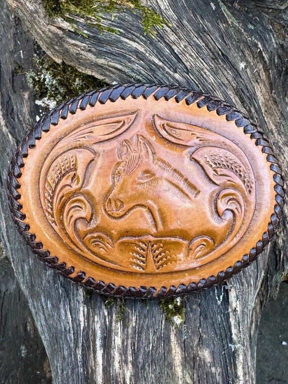 Vintage 70s tooled leather horse belt buckle