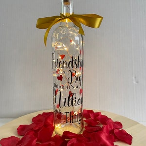 Friendship isn’t a big thing it’s a million little things Light up Bottle
