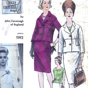 May include: A vintage sewing pattern for a two-piece suit. The pattern is by Vogue Couturier Design, John Cavanagh of England, and the pattern number is 1192. The image shows three women wearing different versions of the suit. One woman is wearing a white suit, another is wearing a pink suit, and the third is wearing a green top and a white skirt.