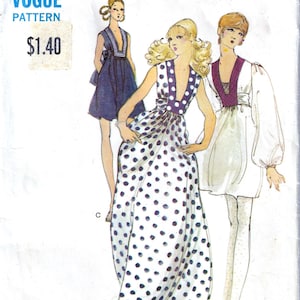 May include: Vintage Miss Vogue sewing pattern featuring three illustrated fashion designs. The designs include a navy blue dress, a white dress with purple accents, and a white dress with black polka dots. The pattern is labeled "Vogue Pattern" and the price is $1.40.