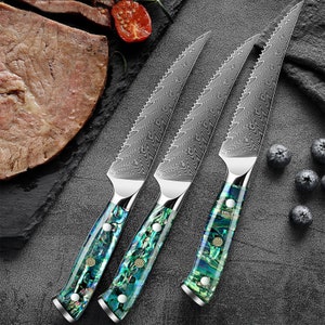 Damascus Steel Steak Knife Set with Abalone Shell Handle 3 Piece on Table