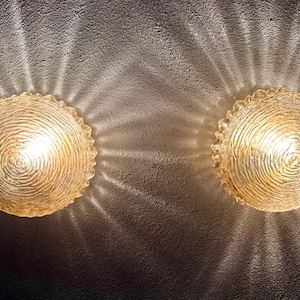 Vintage amber pair of wall lights