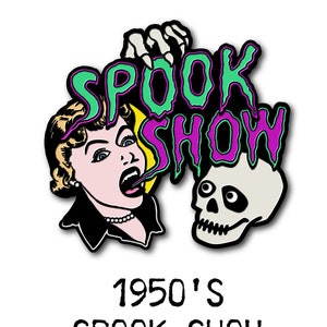 May include: A green and purple enamel pin featuring the text "SPOOK SHOW" and a cartoon image of a woman screaming with a skull behind her. The text "1950's SPOOK SHOW PIN" is below the image.