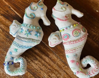 Linen seahorse hand embroidered with multicoloured thread and glass beads - with ring to hang anywhere you like