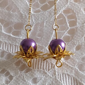 Boucles d'oreilles fleurs violettes