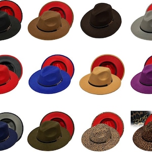 May include: A set of 12 fedora hats in various colors, including black, brown, gray, red, blue, purple, green, and leopard print. Each hat has a red interior and a gold chain detail.