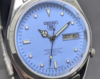 Rare vintage Seiko 5 automatic day date movement number 7009A Japan made men's watch