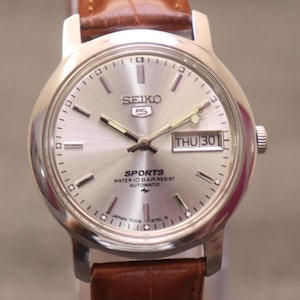 Rare vintage Seiko 5 automatic day date movement number 7s26A japan made men's watch