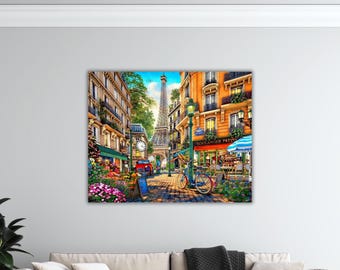 May include: A vibrant painting depicting a Parisian street scene, featuring the Eiffel Tower. Buildings with balconies and shops line the cobbled street. Bicycles are parked outside a bakery and flower shop. A clock tower is also visible in the scene.
