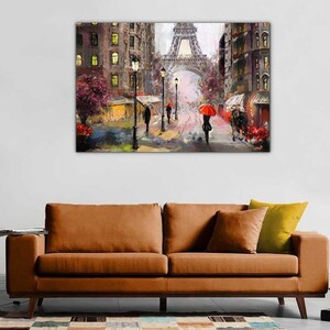 May include: A painting depicting a Parisian street scene with the Eiffel Tower in the background. The street is lined with buildings and streetlights, and people are walking under red umbrellas. The painting is executed in a painterly style with an emphasis on light and shadow.